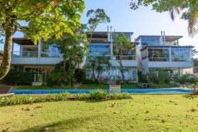 Casa com piscina em frente à Praia de Camburi